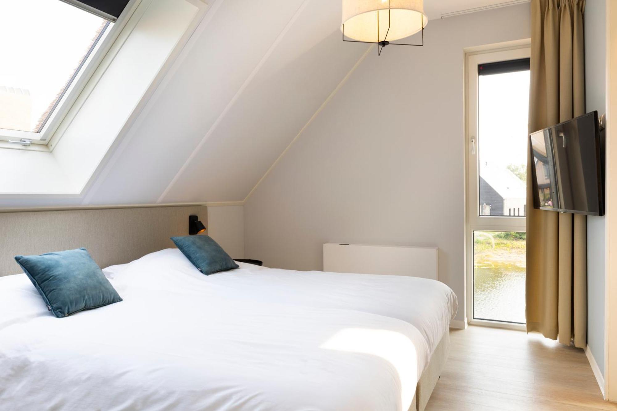 Dormio Resort Nieuwvliet-Bad Pokoj fotografie